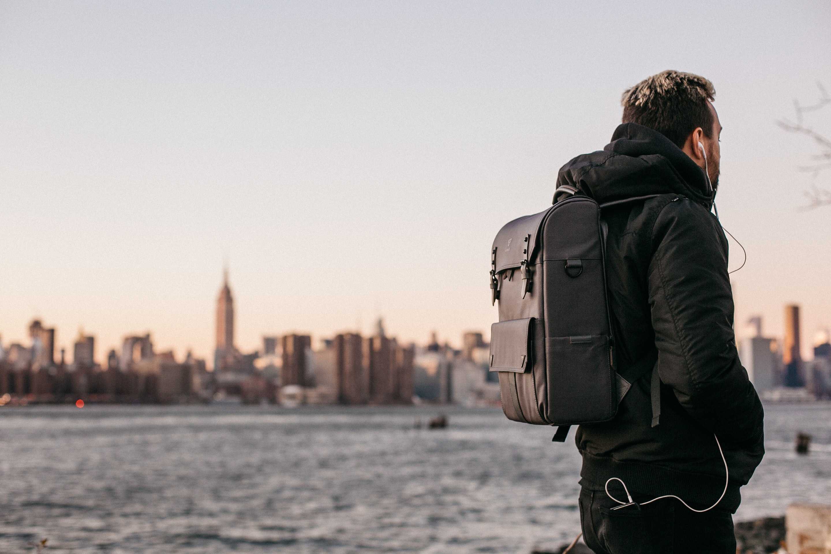 digital nomad walking with a backpack
