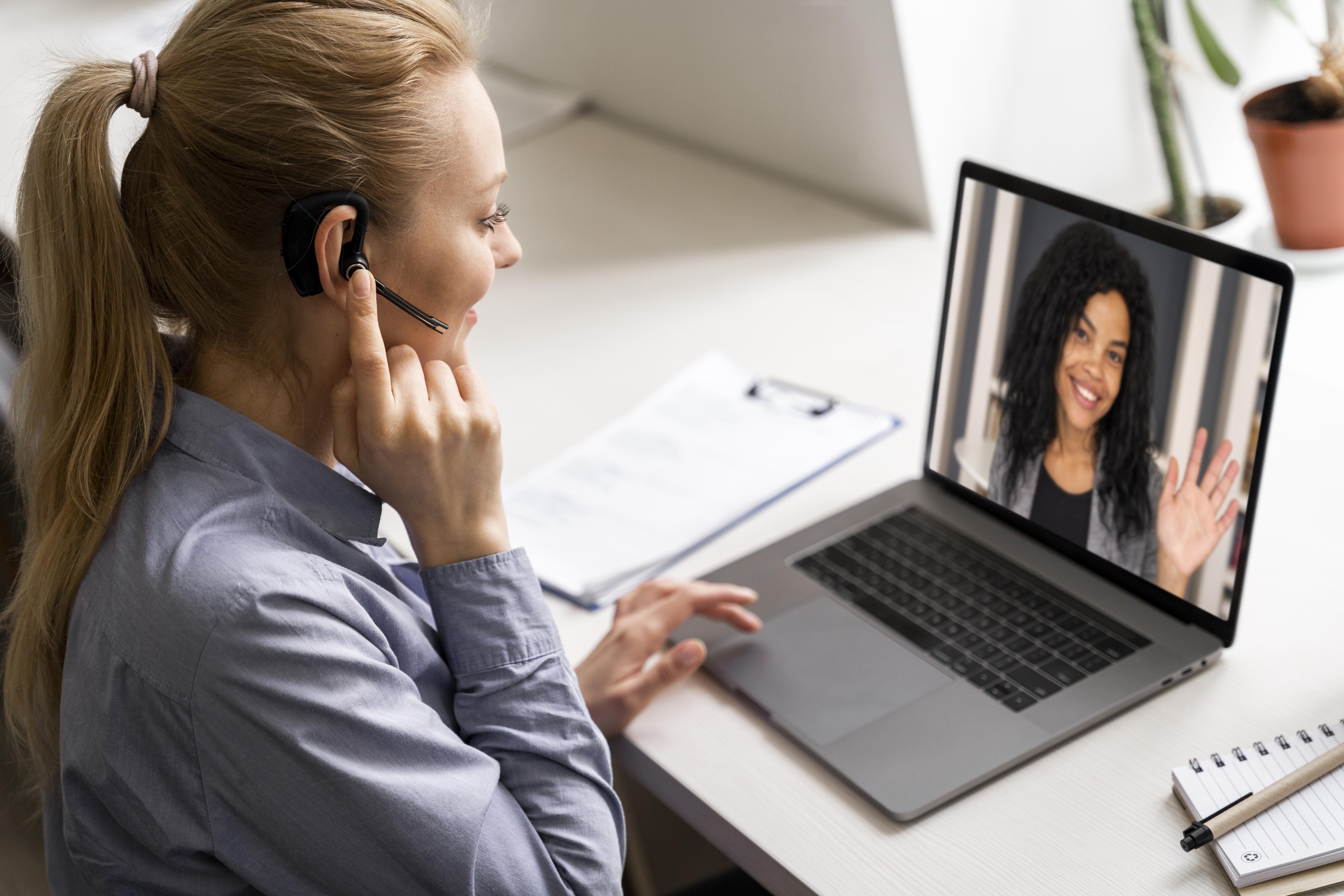 Two women having an interview through Webex