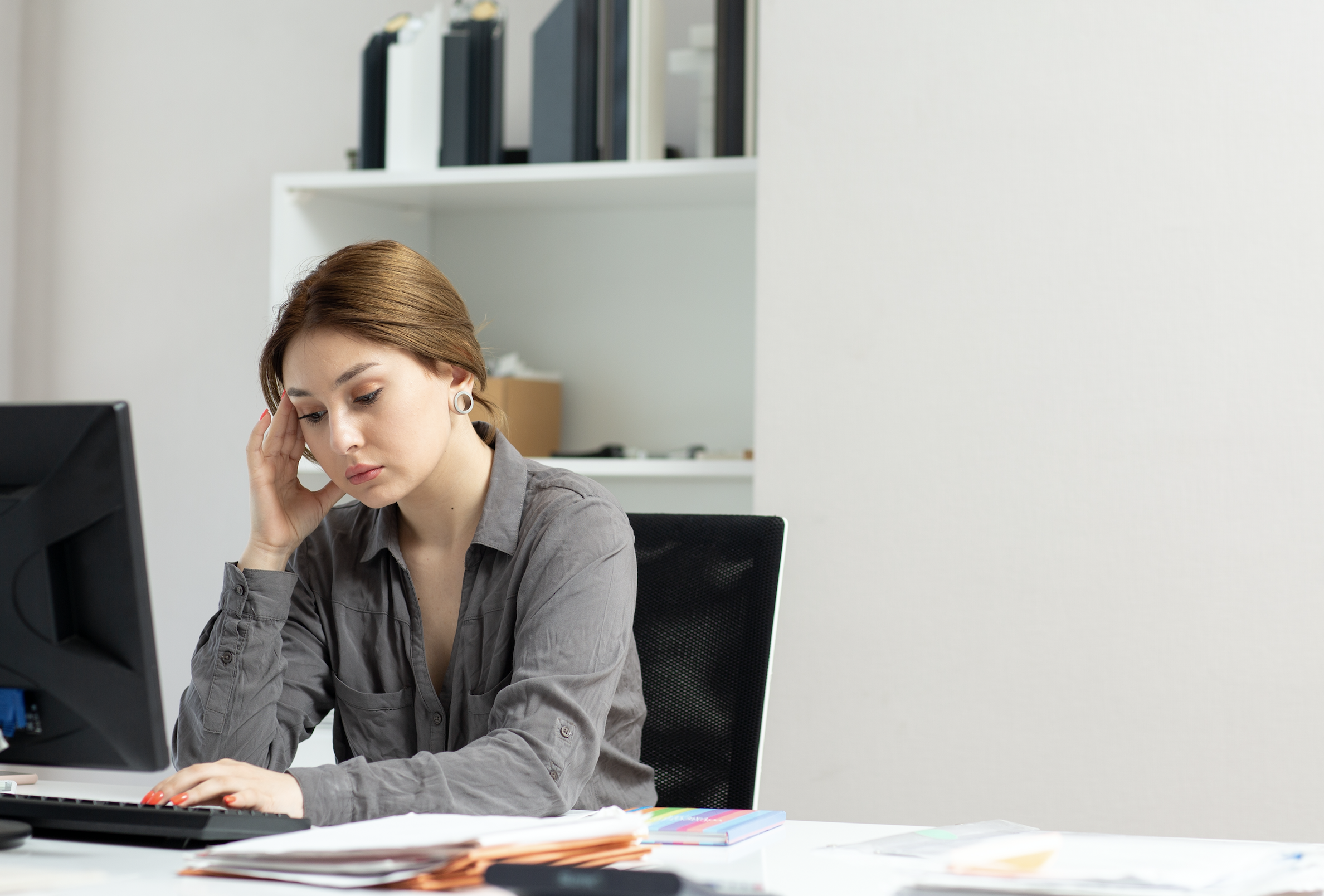 A female employee struggling with a skill issue