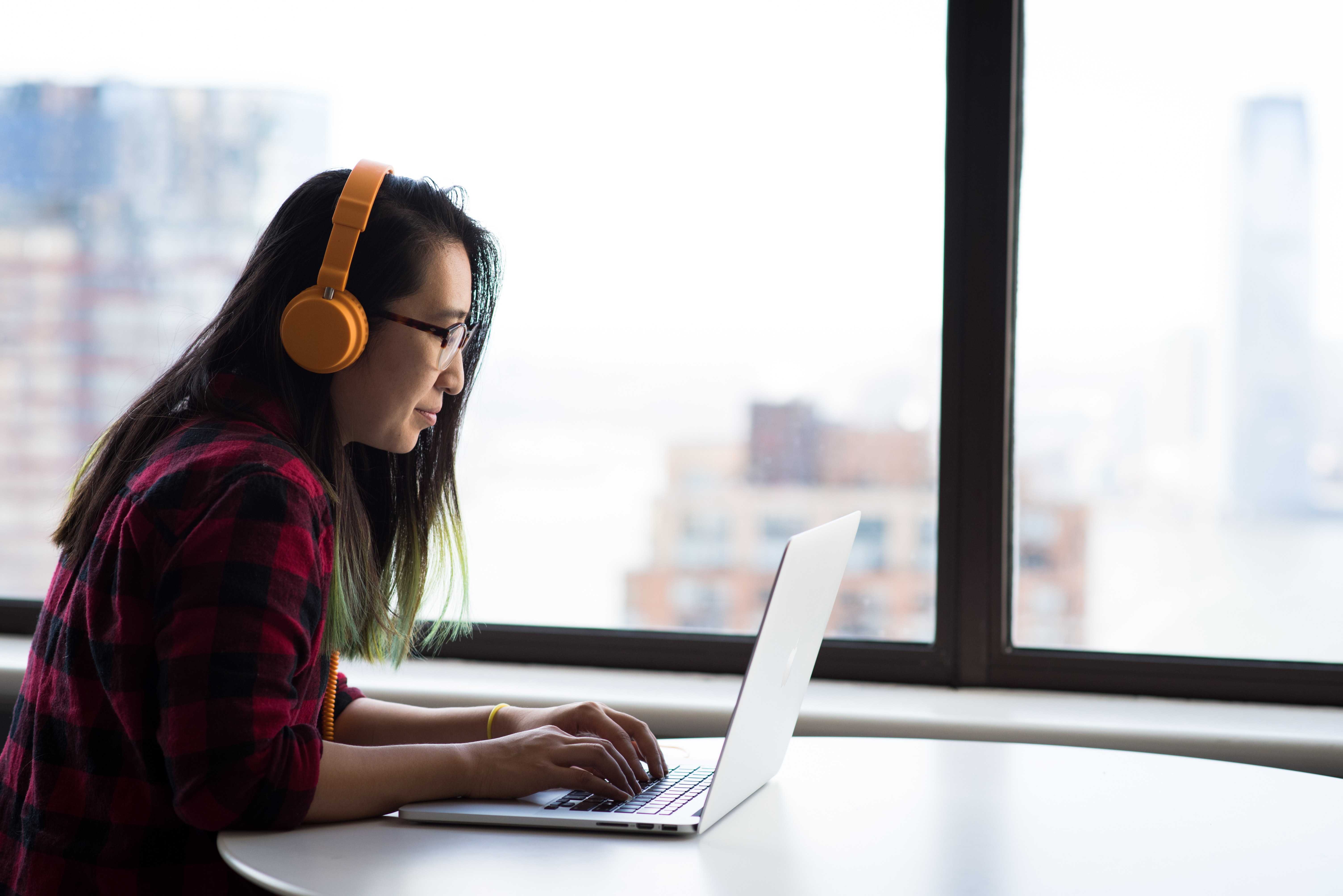 Women working in headphones