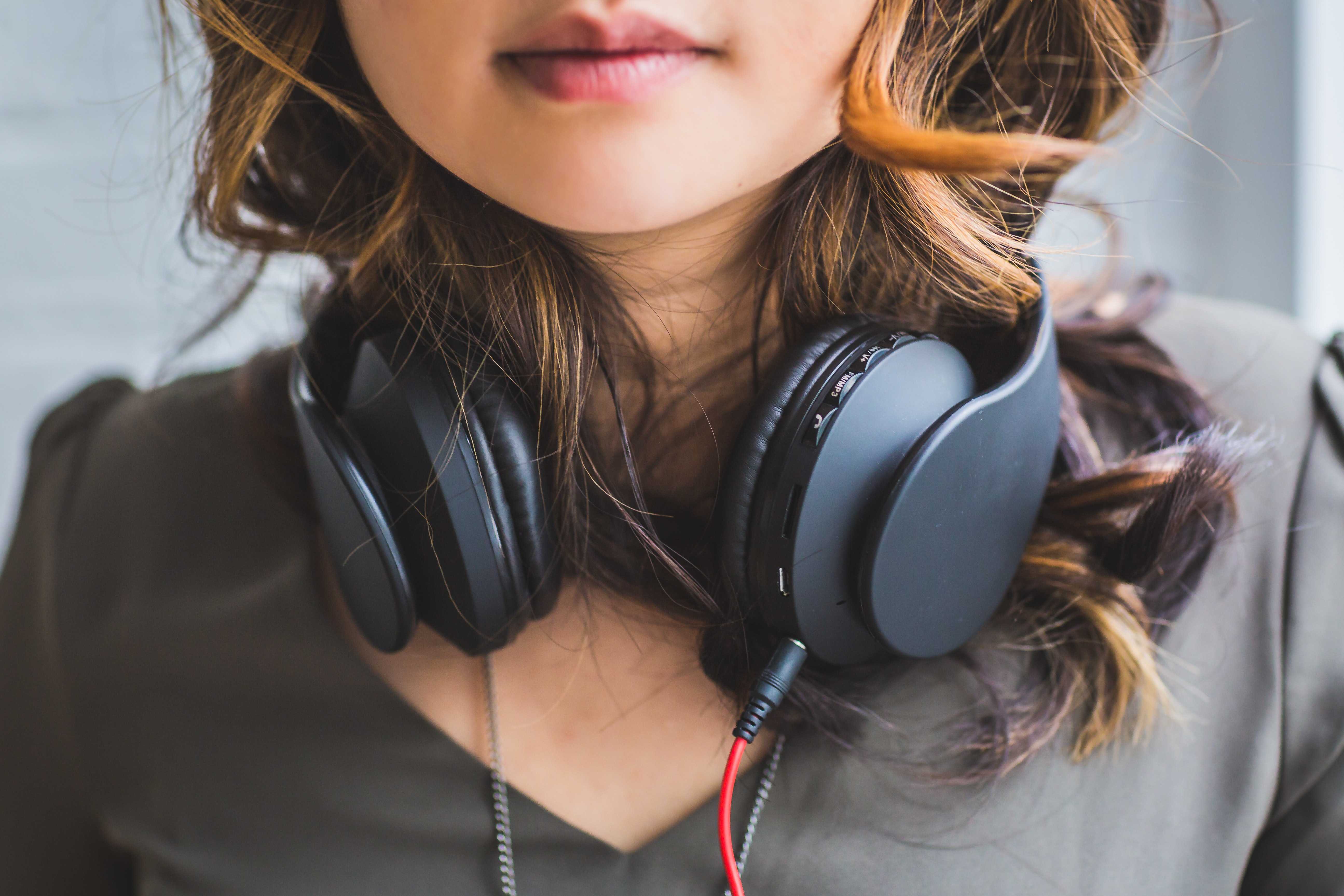 Women with noise cancelling headphones